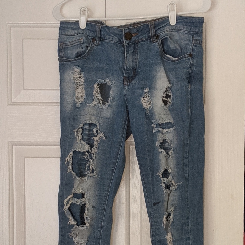 Ripped light blue jeans